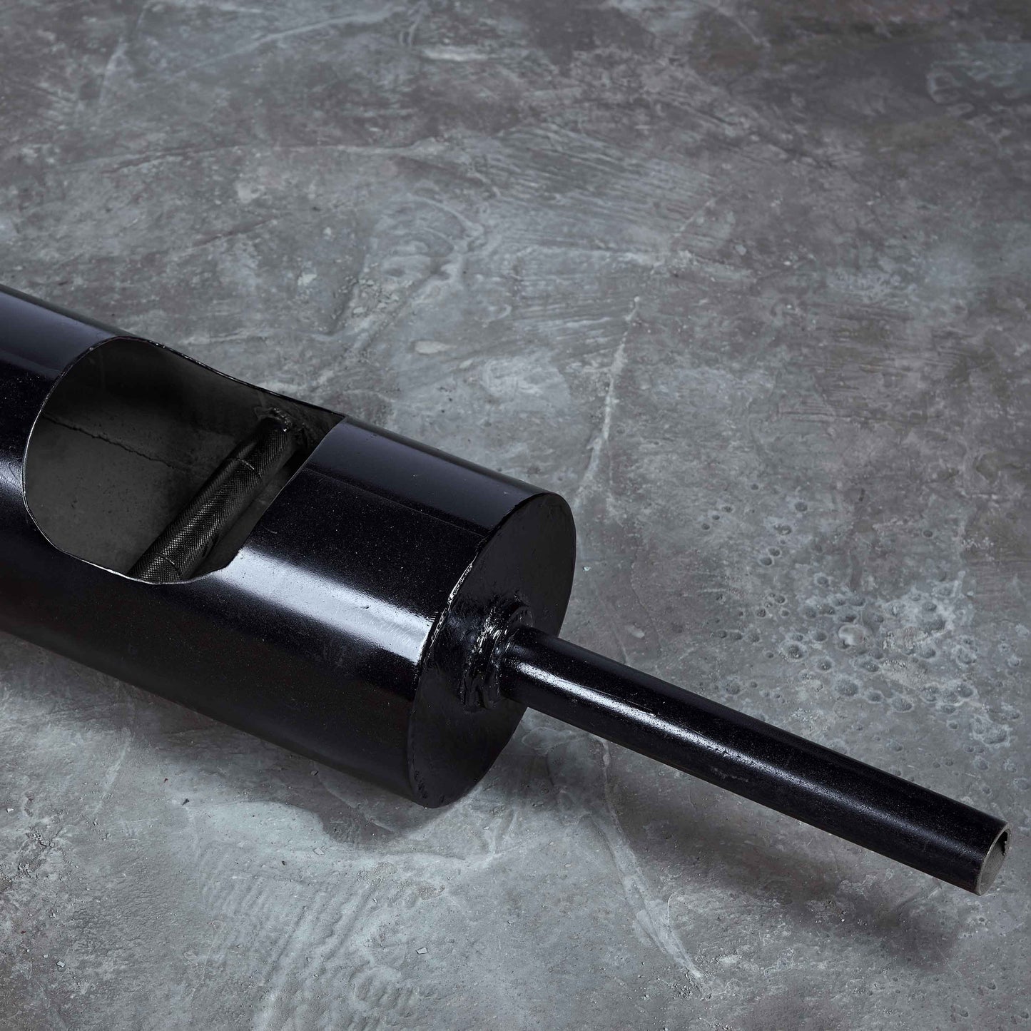 Strong Man Log like barbell with knurled parallel neutral grips.