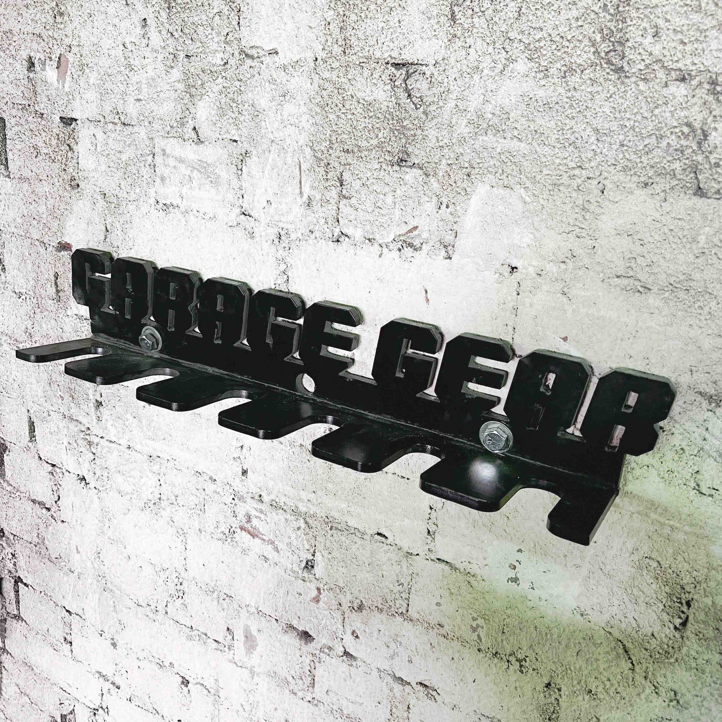 Space saving storage solution. A wall hanging rack to hang 6 barbells.